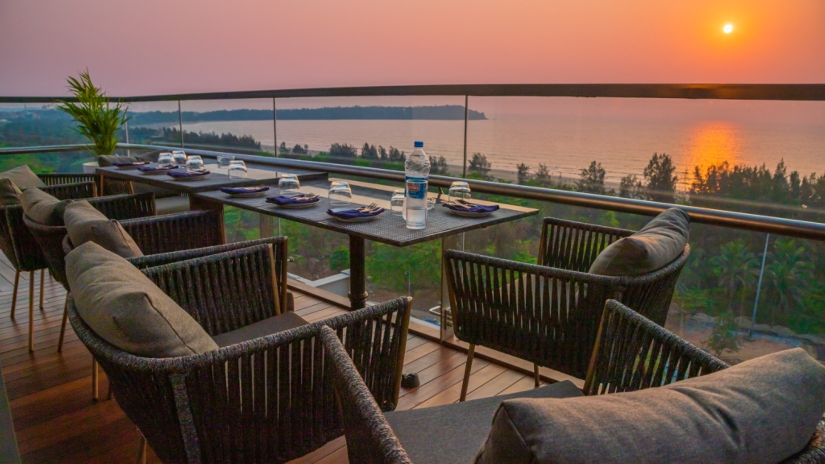 Chairs in a balcony at sunset