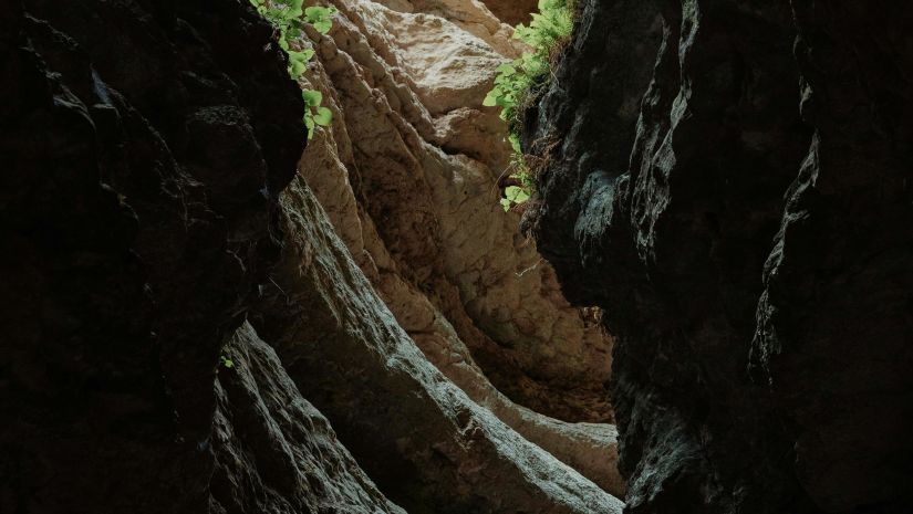 Image of interior of caves with dim lighting 