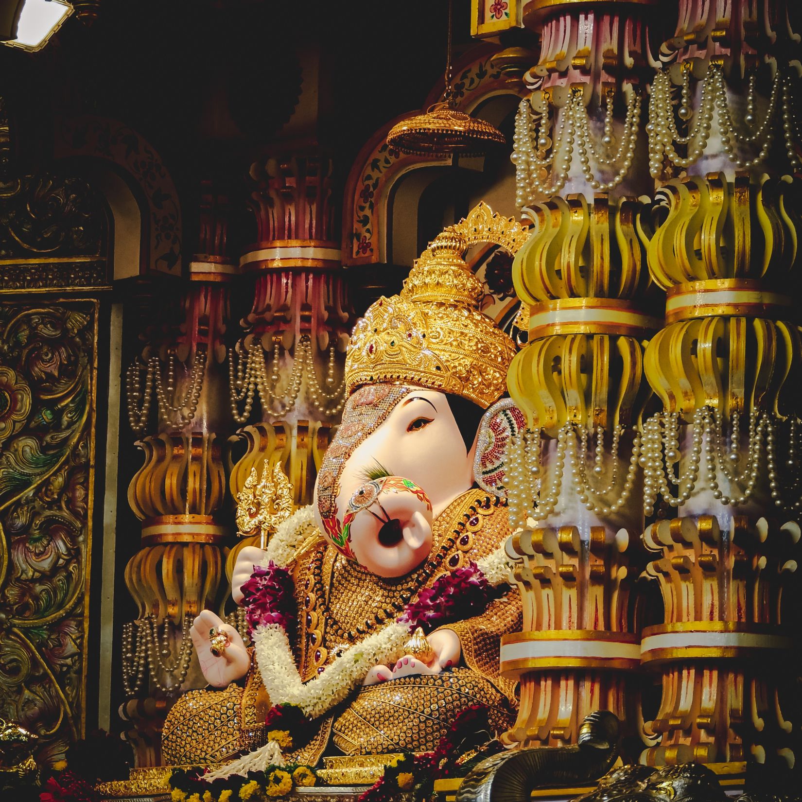 A highly ornamented sculpture of Lord Ganesh