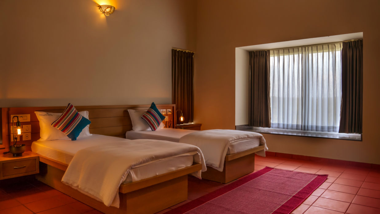 Room with twin beds - Niraamaya Retreats Vaidekam Kannur 