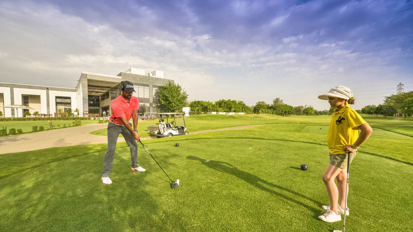 guests playing golf at Karma Lakelands