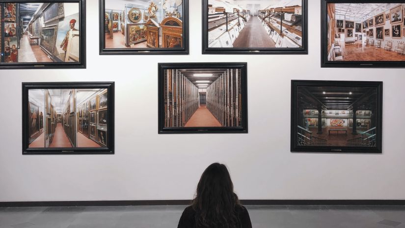 A person looks at the pictures inside the museum, one of the most interesting places to explore in South Goa