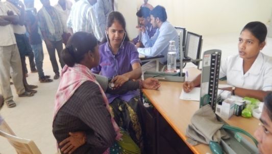 Doctors checking patient