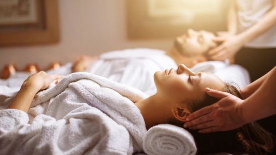 Guests taking spa treatment at a resort in manesar