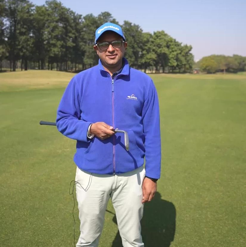 Anup Singh on a gold course during daytime - Karma Lakelands