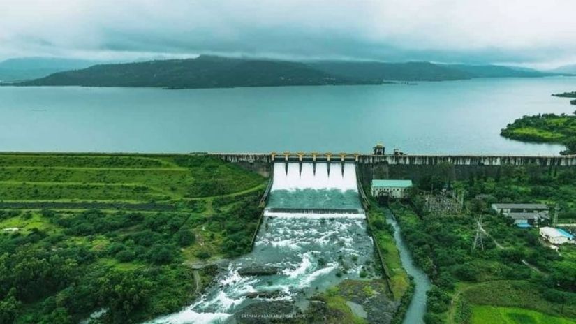 An aerial view of a dam and a lake