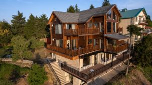 Facade of Avalon Retreat, Kanatal  surrounded by trees 