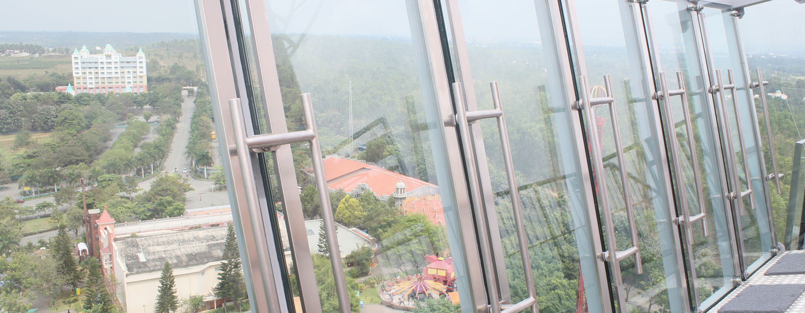 Wonderla Bengaluru Park - view of a glass barricade with metal flooring