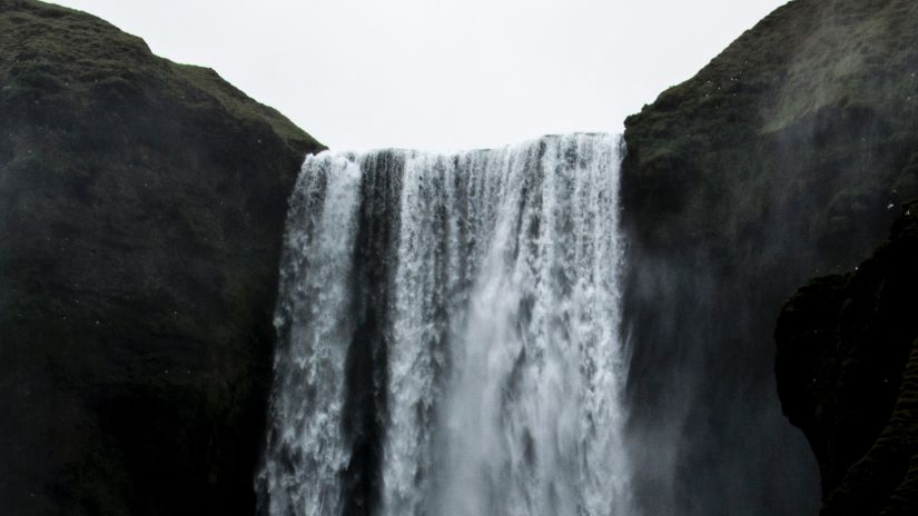 A waterfall with a strong outpour