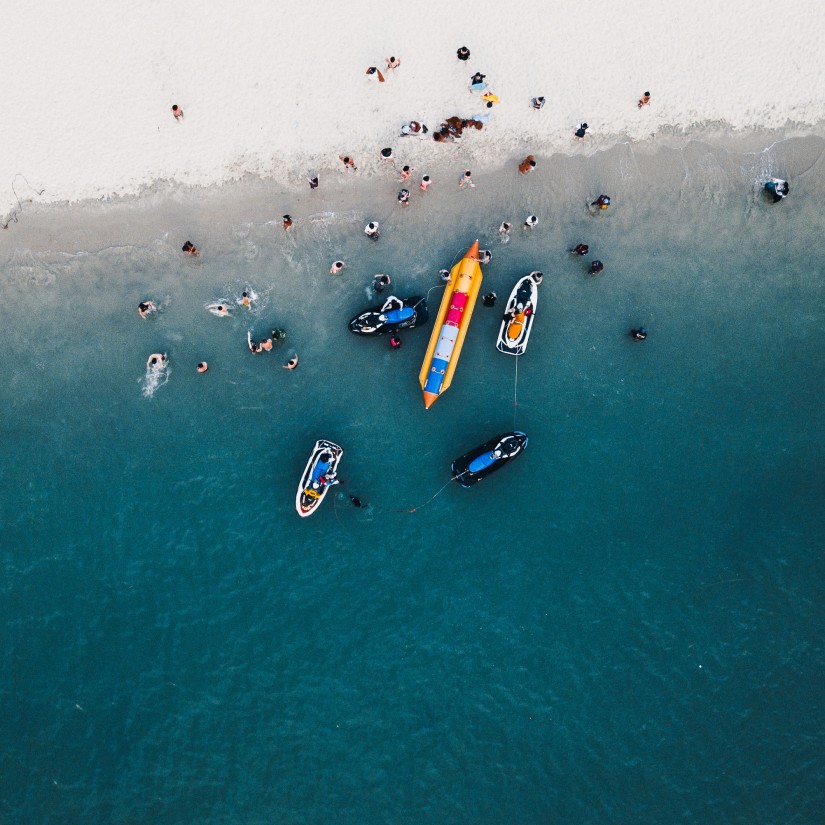 bird's eye view of boats on a beach 31