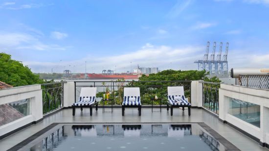 Roof top with swimming pool at the old court house by abad, fort kochi