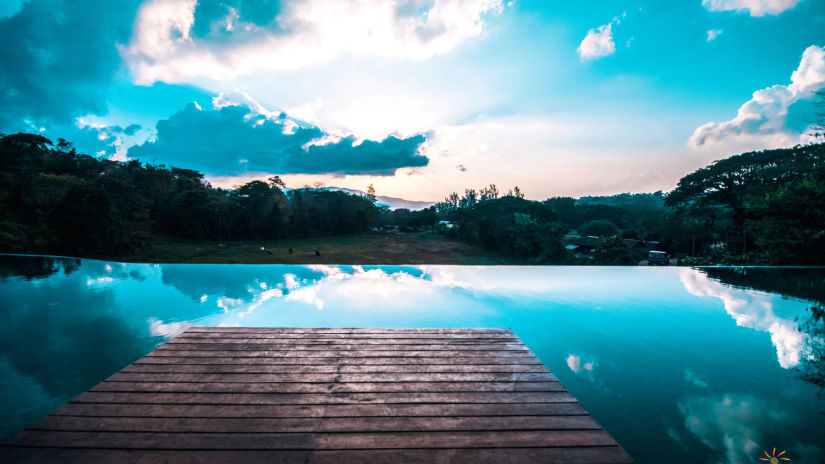 Wooden deck by the infinity pool in port blair 2 - Symphony Samudra Beachside Jungle Resort And Spa, Port Blair