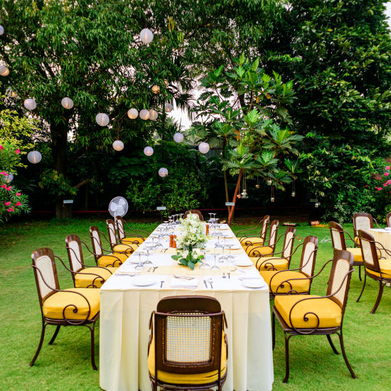 an outdoor dinner setup for a wedding celebration in goa