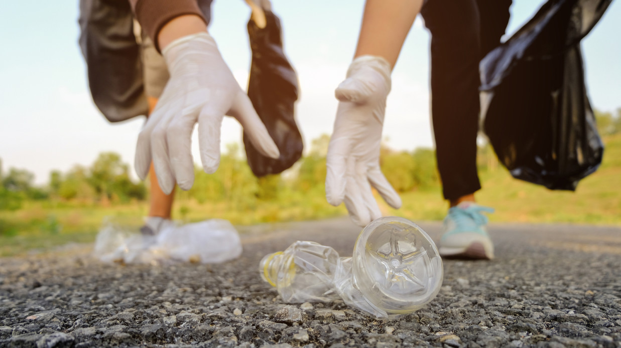 people picking up garbage