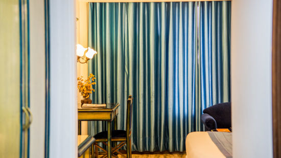 A blue curtain in a room | Sun Park Hotel & Banquet, Chandigarh - Zirakpur