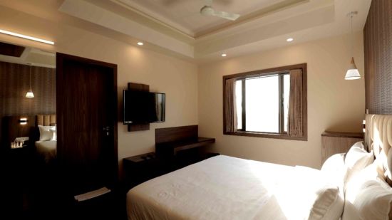 deluxe room at Pride Biznotel, Sasan Gir