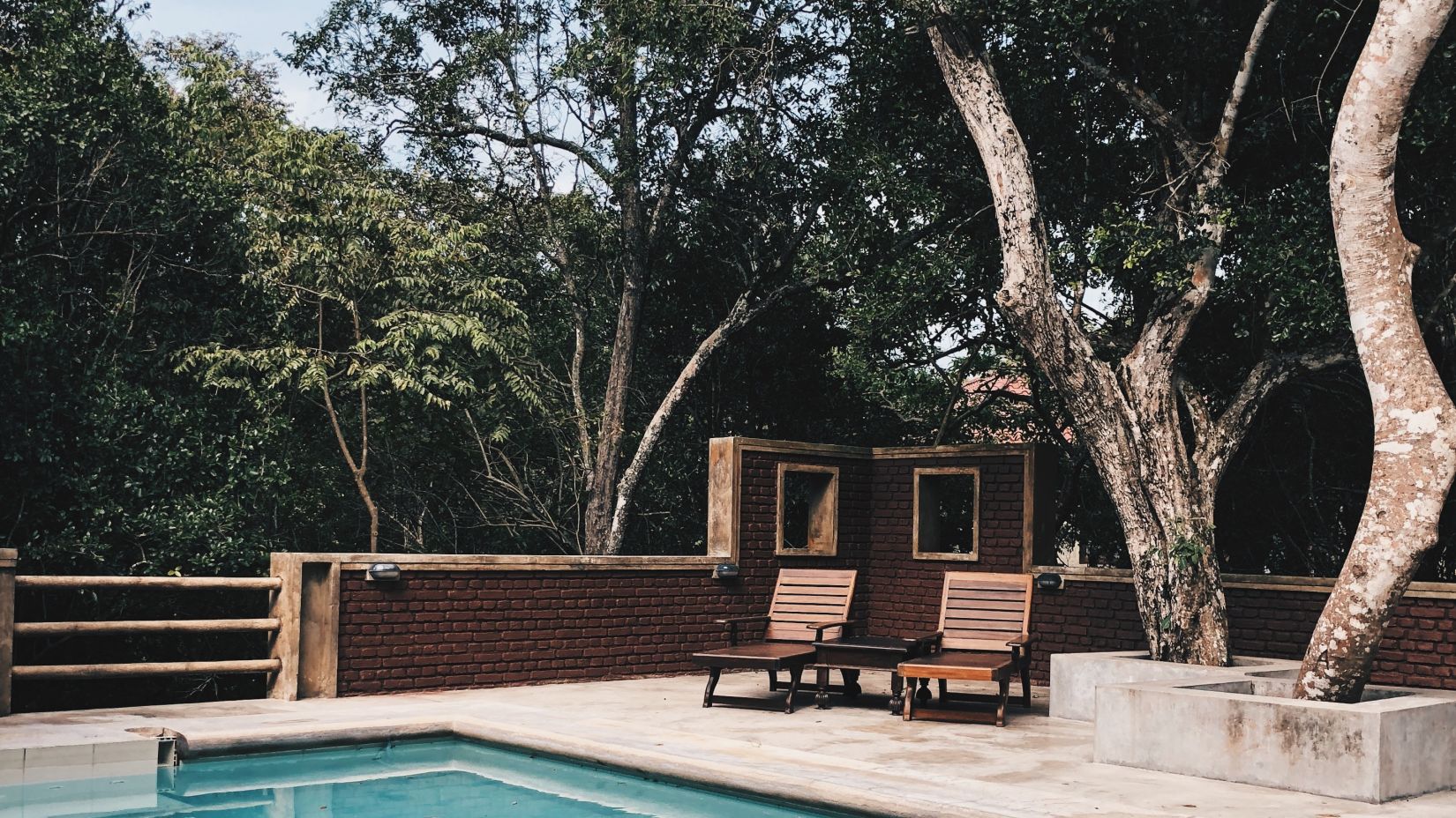 Image of a swimming pool @ Lamrin Ucassaim Hotel, Goa