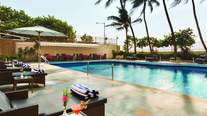 poolside patio at Ramada Plaza Palm Grove 3234