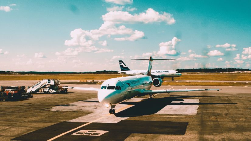 A lone plane at an airport