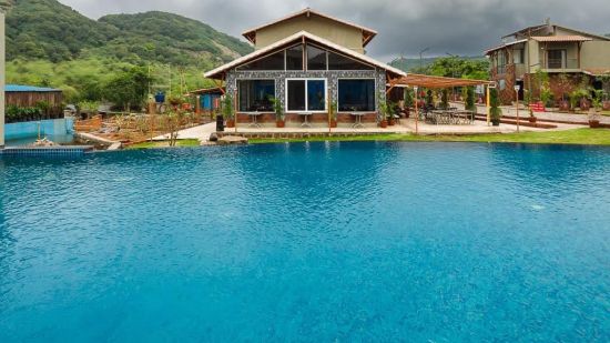 pool view at daytime - Mastiff Grand La Villae Resort, Lonavala