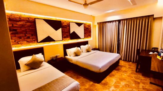 twin sharing beds offered at Super Deluxe rooms in Lonavala - Zara's Resort