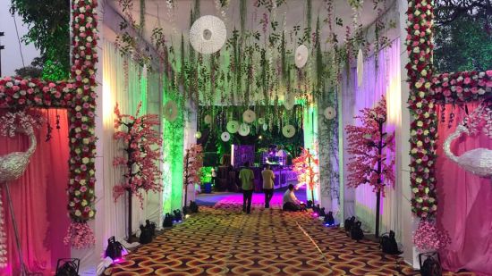 alt-text an entrance to a hall decorated for an event - Zara's Resort 1