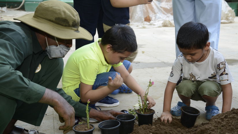 Kids participating in gardening