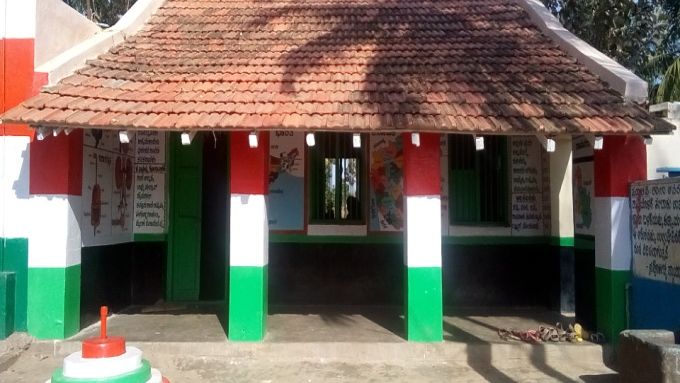 new building with tricolour pillars