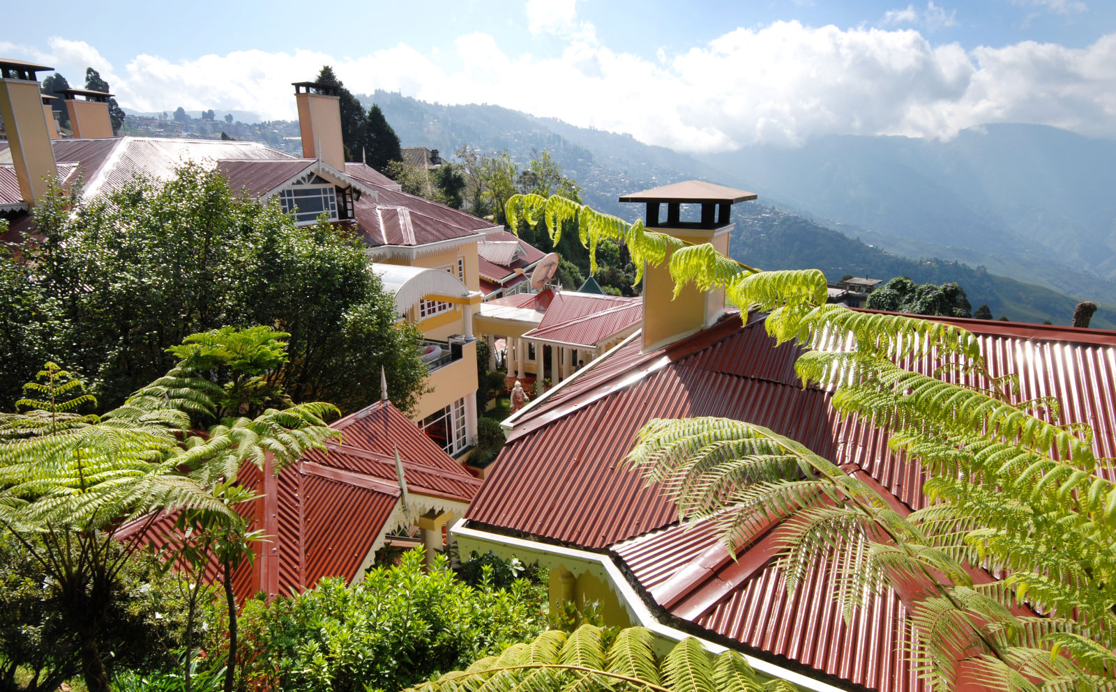 Premium Hotels Darjeeling - aerial view of the resort and the mountains - Mayfair Hill Resort, Darjeeling