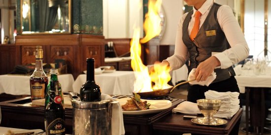 a chef looking in a restaurant