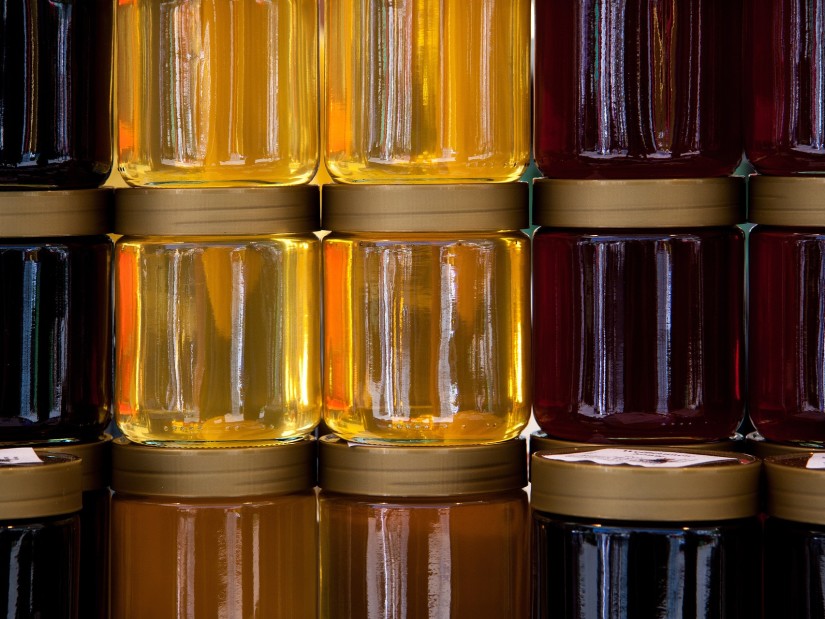 The Serai Kabini - glass jars containing various types of honey