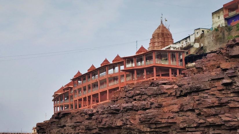 A temple located by a river -Fort JadhavGADH 