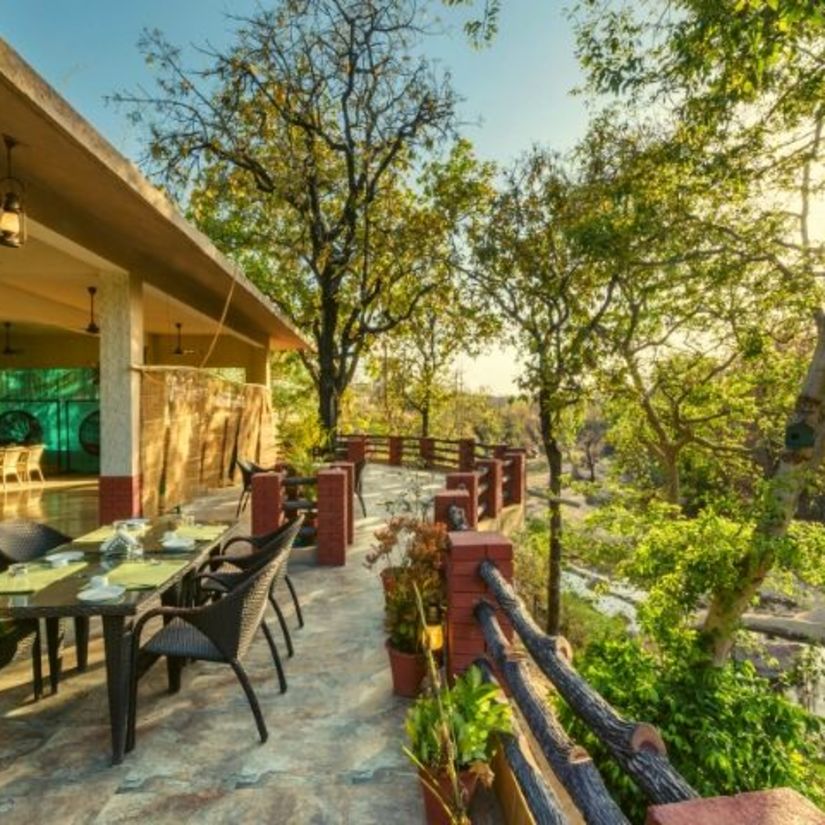 A view of the dining area at the resort in Pench | The Riverwood Forest Retreat, Pench