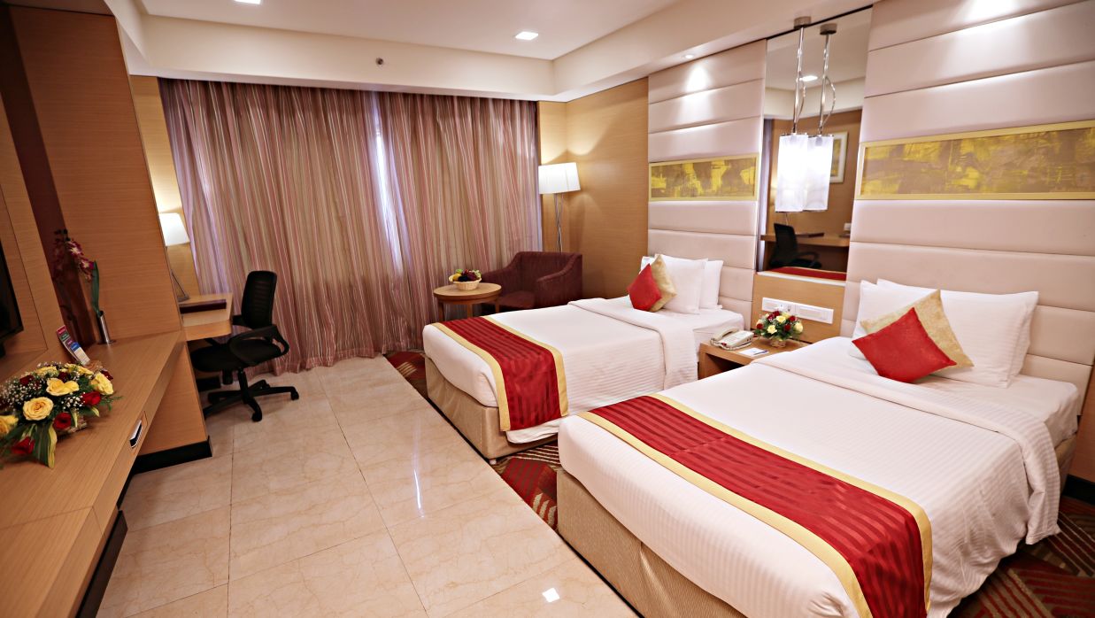 twin bedding offered at Premium Room in Vizag 2