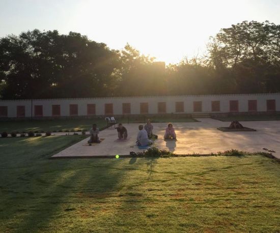 alt-text Yoga at the Rajputana Lawns - Umaid Lake Palace