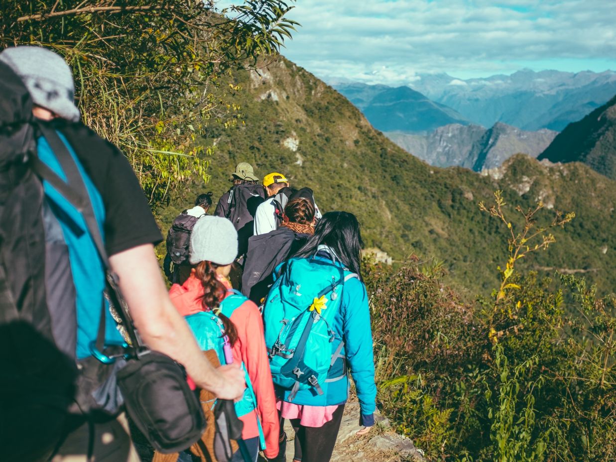 a group of people doing trekking