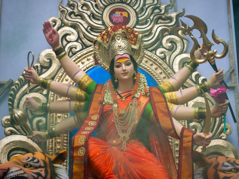 the sculpture of a female deity