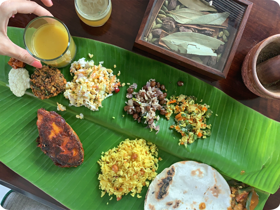 a sadhya laid out on a banana leaf 9827592