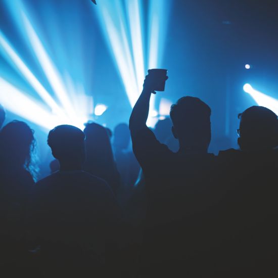 alt-text people dancing at an event in goa