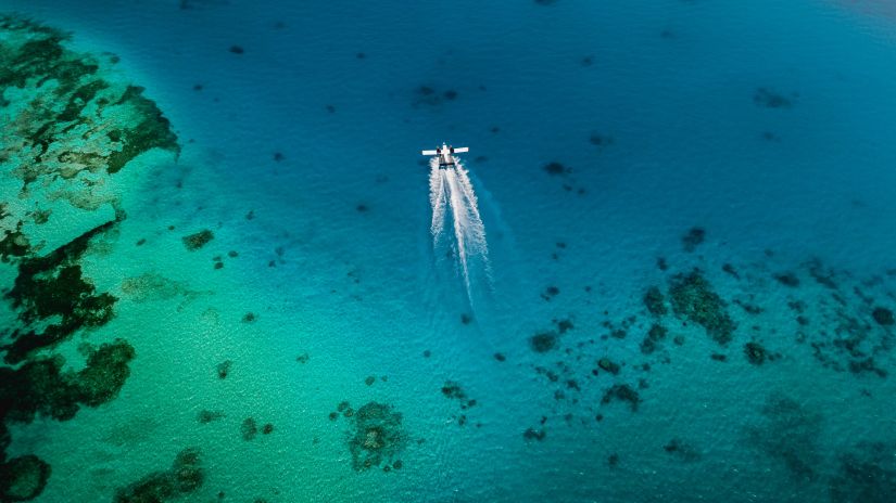 aeroplane in flight over the ocean