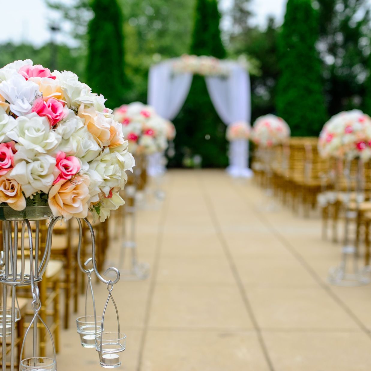 a view of a seating arrangements with pathway for the bride to walk