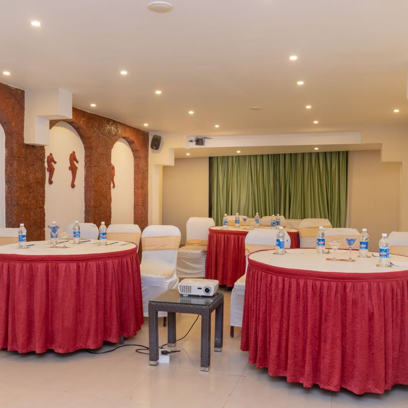 Round table seating at Opera Banquet Hall at Kyriad Prestige Calangute, Goa