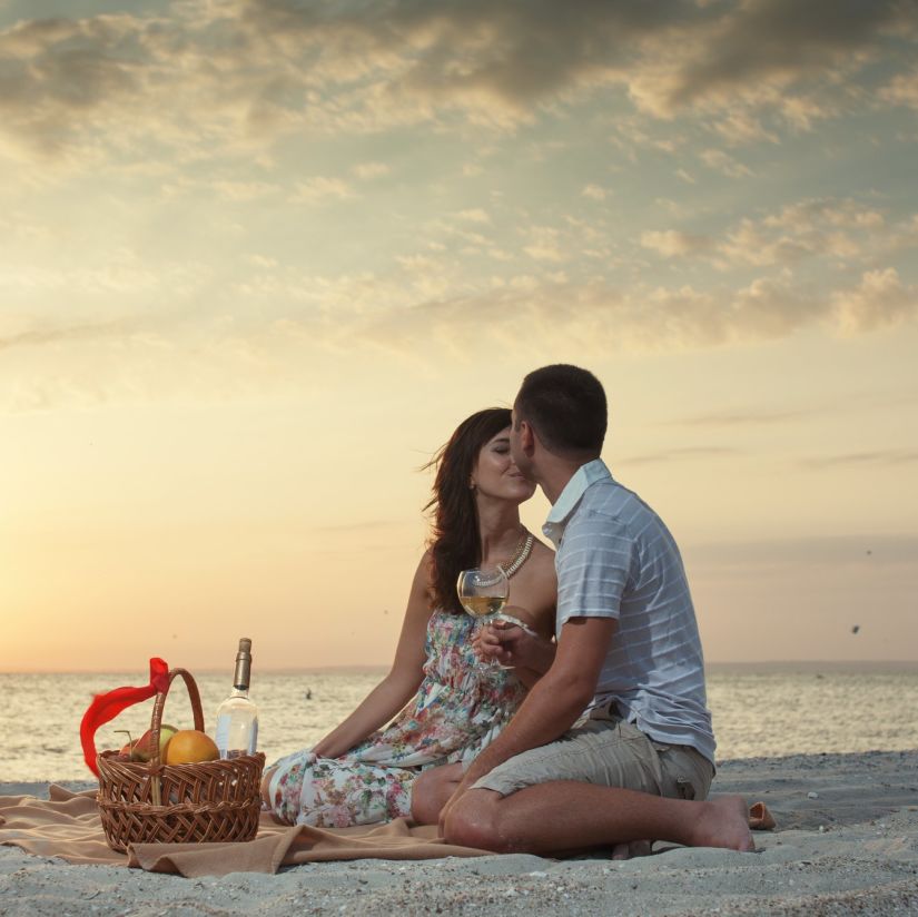 couple relaxing on the beach 