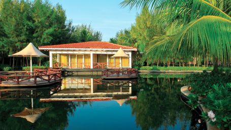 Bermuda Exterior with Deck in front of a lake at Ocean Spray, Pondicherry