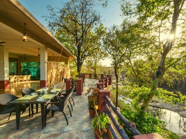 A view of the dining area at the resort in Pench | The Riverwood Forest Retreat, Pench