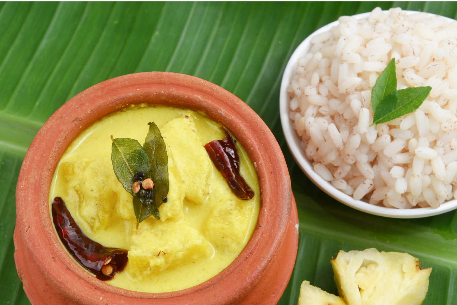 Rice and curry on banana leaf