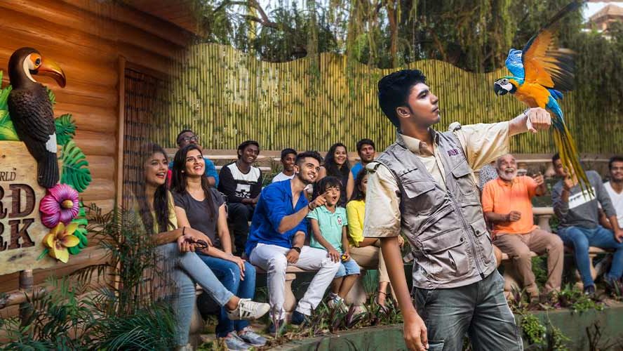 bird park esselworld,  a group taking a selfie in front of the bird park entrance