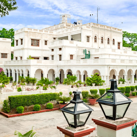 Facade with small shrubs on the compound - The Baradari Palace