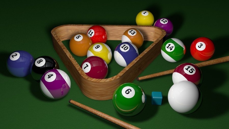 billiard balls placed on the pool table