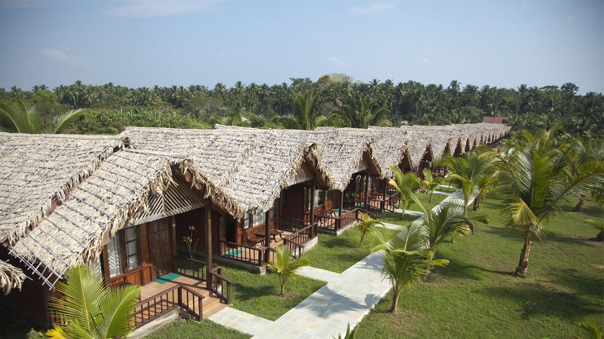 Cottages with thatched roof at Symphony Palms